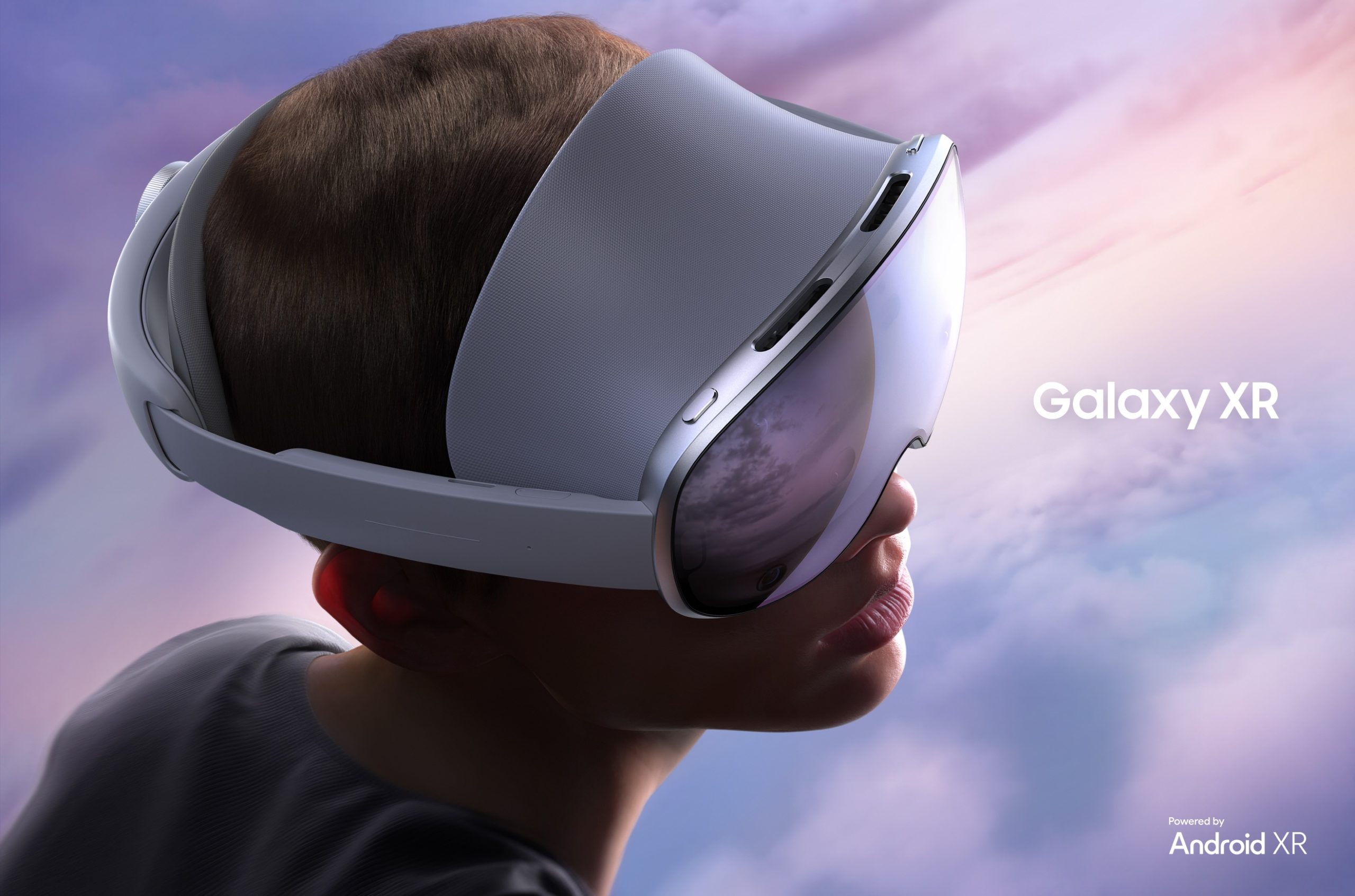 A person wearing the Galaxy XR headset, looking up into a pastel sky